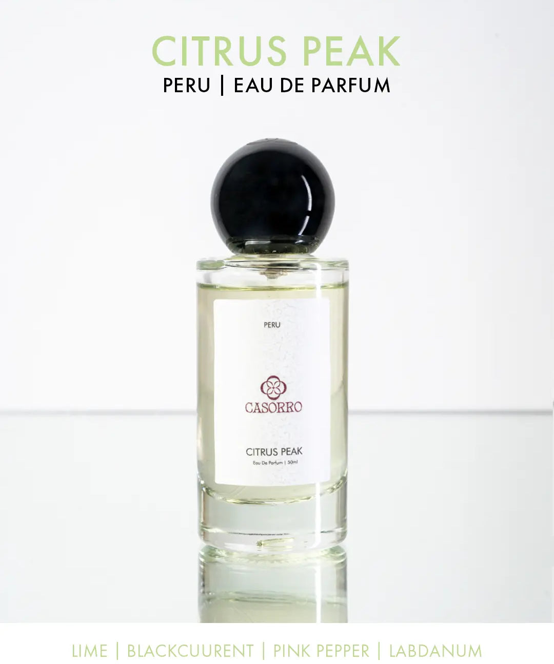 Perfume bottle labeled 'Citrus Peak - Peru' by CASORRO on a white background