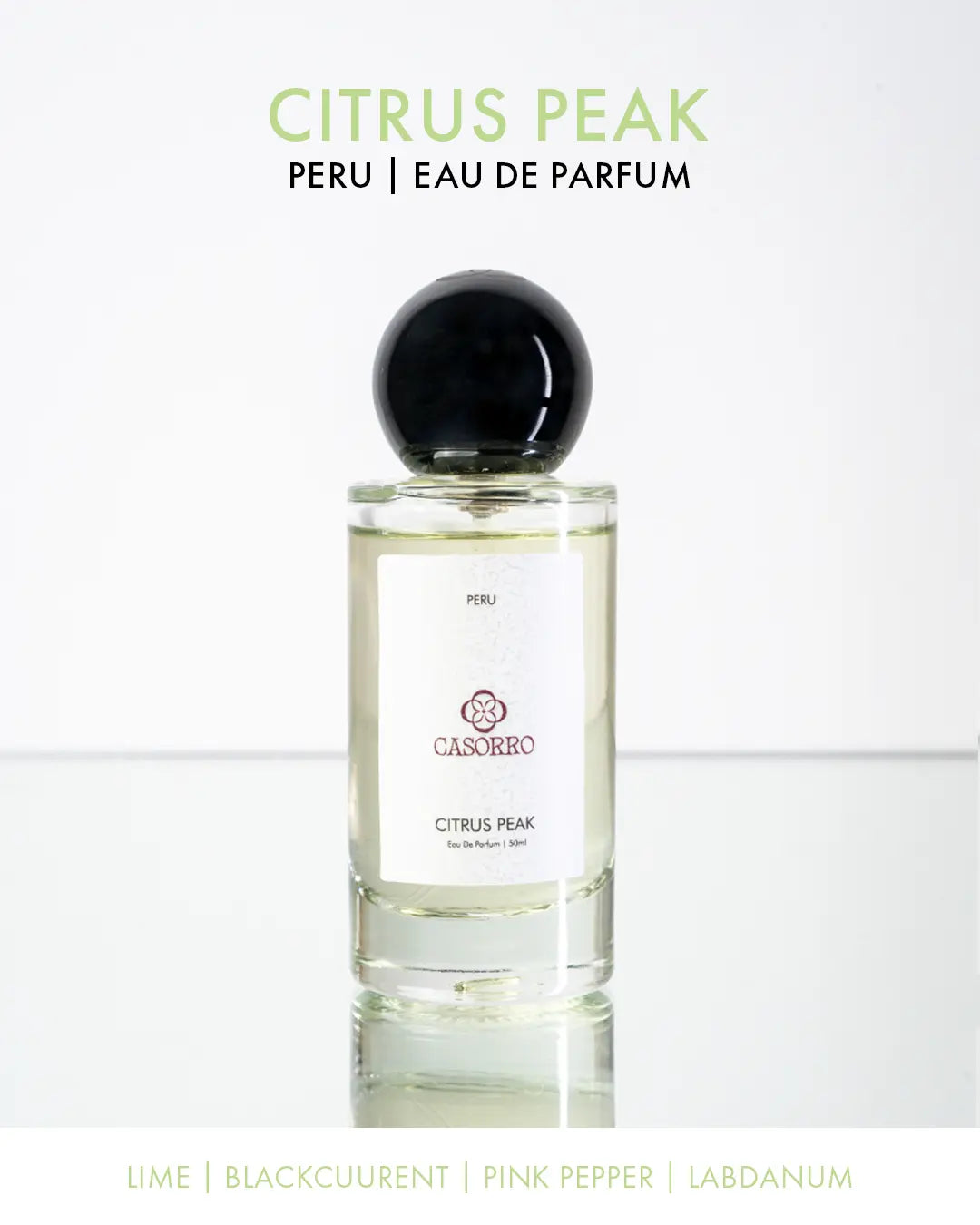 Perfume bottle labeled 'Citrus Peak - Peru' by CASORRO on a white background