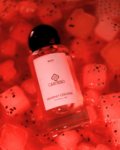 Bottle of Casorro Heavenly Cocktail on a red background with fruit pieces