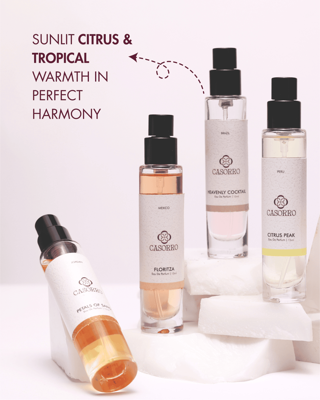 Casorro perfume bottles with a focus on citrus and tropical fragrances on a white background.